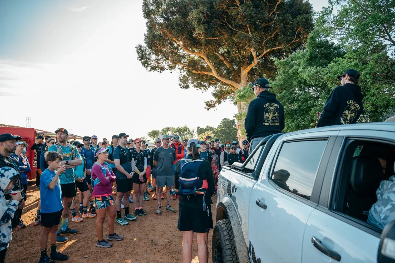 The founders briefing runners from the back of a bakkie at a recce run